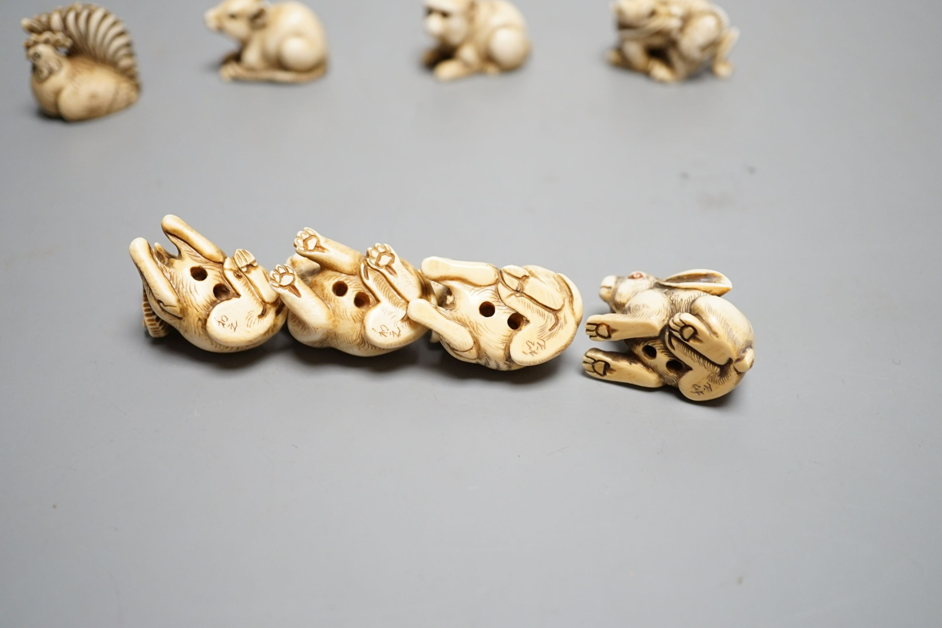 A set of 12 Japanese ivory zodiac animal netsuke, Taisho/early Showa period, signed